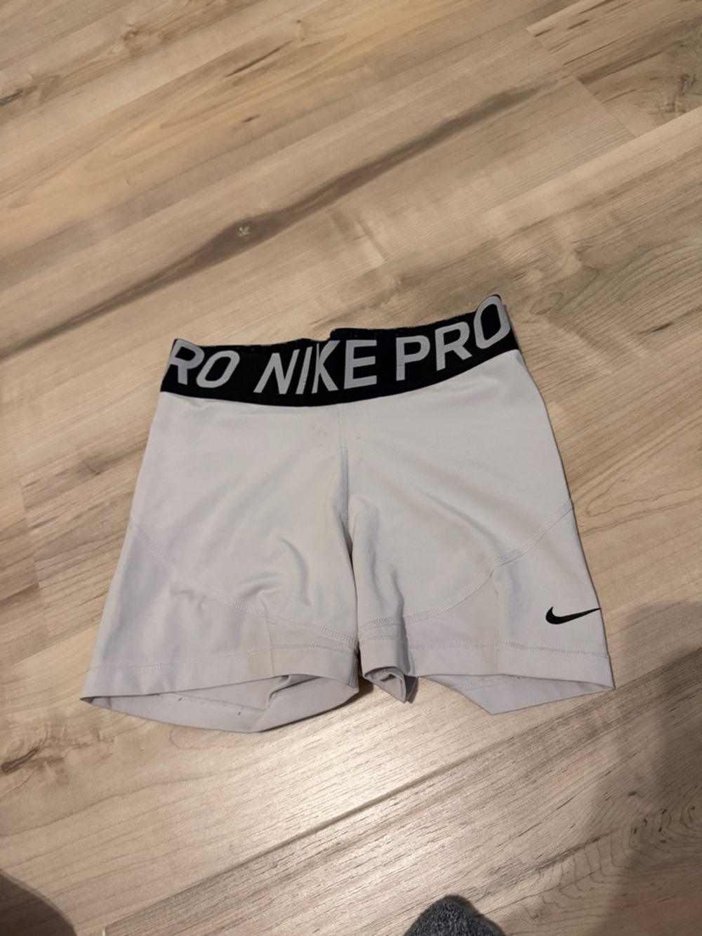 size medium black and white dri-fit nike pros
